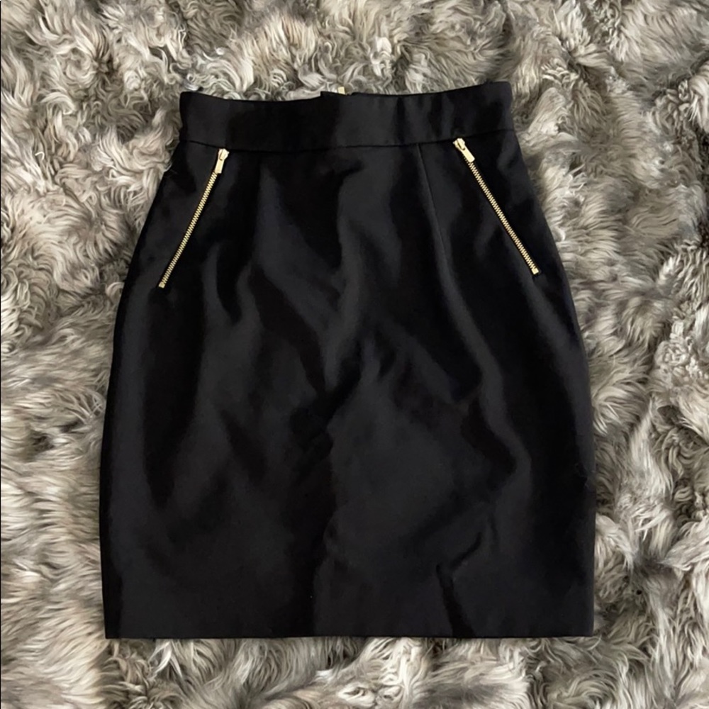 Black skirt with gold zippers
